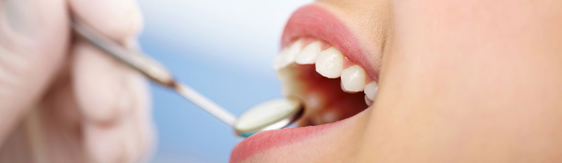 misc-dentist-cleaning-teeth.jpg