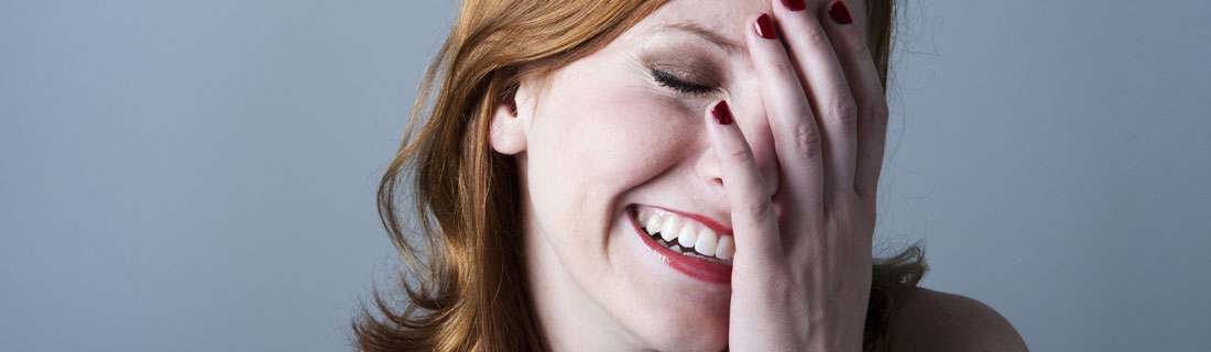 woman-hand-on-face-smiling.jpg