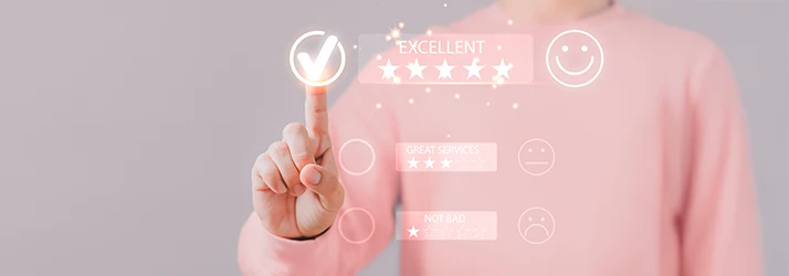 A person in pink points at a transparent screen in the forefront selecting an excellent five star review from the list of options A person in pink points at a transparent screen in the forefront selecting an excellent five star review from the list of options