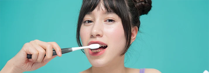 Orthodontics-Brushing-With-Braces-MultiORCS1.webp