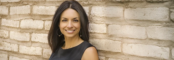 Happy woman smiling confidently after corrective jaw oral surgery procedure. Happy woman smiling confidently after corrective jaw oral surgery procedure.