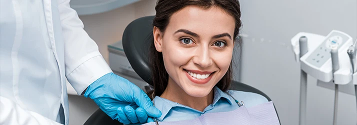 Smiling patient ready for gum grafting procedure by periodontist. Smiling patient ready for gum grafting procedure by periodontist.