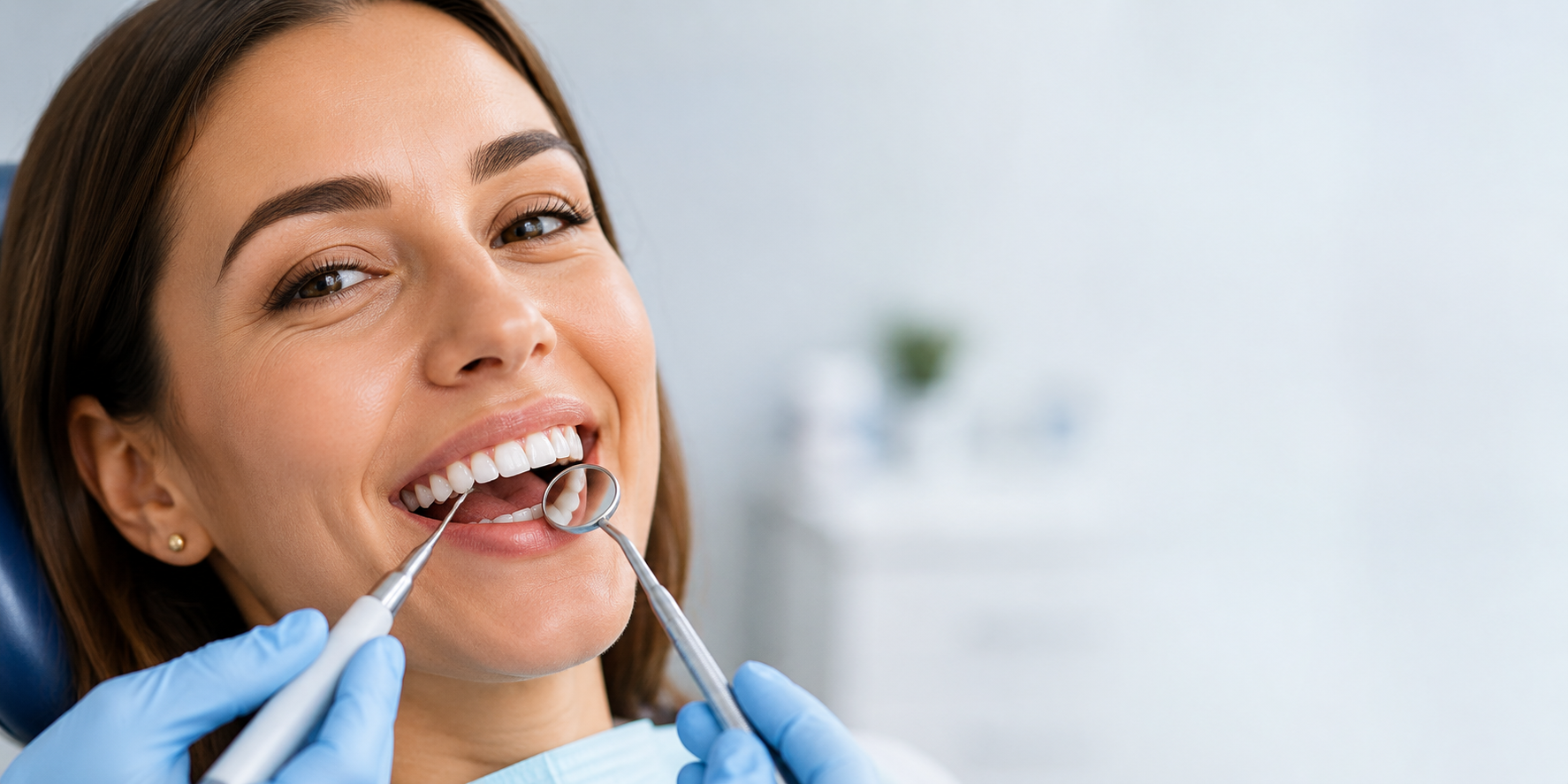 Patient-Smiling-During-Routine-Dental-Examination.png