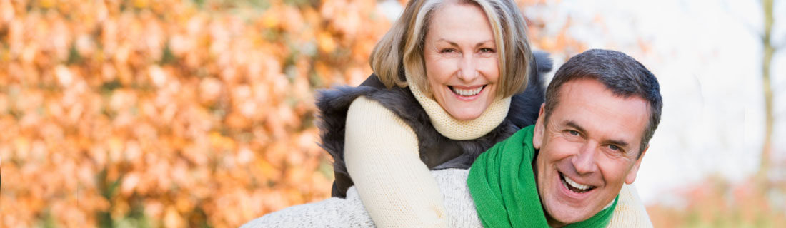 couple-older-smiling-outside-fall.jpg