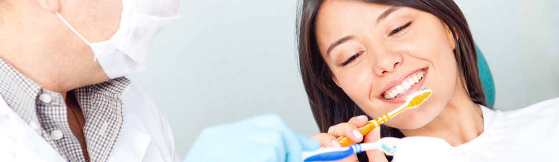 woman-at-dentist-brushing-teeth.jpg woman-at-dentist-brushing-teeth.jpg