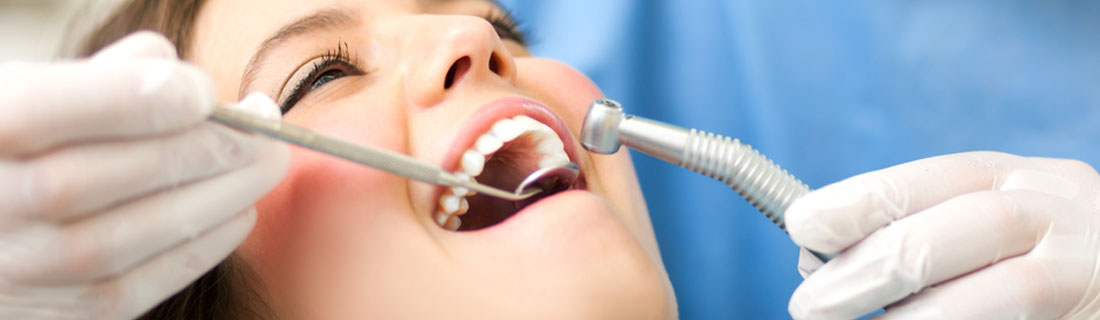 woman-at-dentist-teeth-cleaning.jpg